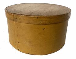 G852 New England thick-walled, round pantry box in original mustard painted surface. Steamed and bentwood construction secured with tacks and wooden-pins. Circa 1880. Natural patina on the inside. Image Properties