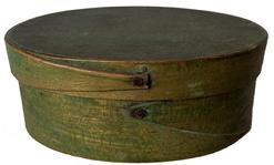 G837 Excellent New England steamed and bentwood oval pantry box retaining its original apple green paint. Opposing finger lapped construction secured with tacks and tiny wooden pins.