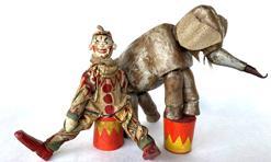 **SOLD** G408 Extremely rare and beautiful circa 1910's Schoenhut 'Humpty Dumpty Circus' Wooden Clown Doll set. This amazing, original collection features a dressed clown doll and elephant complete with drum.The 'Humpty Dumpty Circus' was created by Schoenhut & Sons Ltd, Philadelphia, USA in 1903