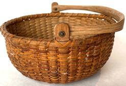 *SOLD* E750 Nantucket Swing Handle Lightship Basket Circa 1890Carved and notched wooden ears, turned, molded and incised bottom; tapered and chamfered oak ribs