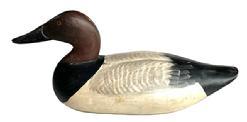L378 Canvasback Duck Decoy carved by Paul Gibson (1902-1984) Havre de Grace, MD. All original paint and condition, with no evidence of ever having a weight on bottom indicating it was perhaps a mantle duck -approximately circa 1930's. Gibson was a hunter and fireman with the Edgewood Arsenal. He retired in 1965 as the Department Chief (McKinney 41). In 1915, Gibson began using his spare time to make decoys.