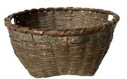 G826 Late 19th century Tightly woven utility, sturdy basket in old green paint with open weave handles and single wrapped rim.
