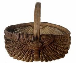 H480  Early, tightly hand-woven oak splint egg basket boasting woven details at the juncture of the two main ribs. Original aged, natural patina surface.