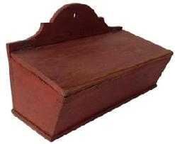 D175 Pennsylvania19th century  Wall Box with the original dry red paint, dovetailed case,with a high arched back ,  canted sides, hinged lid with a divided interior, all original 