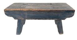 M73 Late 18th century original blue painted Stool featuring half-moon cut out design on each leg/end of the stool and a drop apron on each side that is mortised into the legs. The splayed legs are double mortised through the top. Very sturdy. The wood is walnut. Measurements: 13 &frac14;� long x 6" deep x 5 &frac34;� tall. 