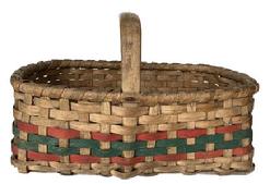 E319 Early 20th century Gathering Basket from Delmar Delaware, with a single wrapped rim and a steamed and bent handle with two red woven bands and one green; which is typical of the type of Basket. It is heavy constructed.