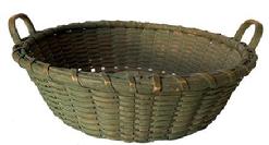  G828  Late 19th century Beautiful shallow utility basket in original green paint.  Tightly woven, double handled round design with two attached notched handles, canted sides with single wrapped rim and a dramatic pushed up bottom.  -  Great condition. Measurements: 13 1/2" diameter x 3 3/4" tall