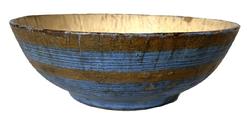 H1058 Very thin, delicate turned wooden footed bowl bearing original Blue painted exterior decorated with two gold painted bands. Interior boasts original white paint bearing significant paint crackling due to age and use. Measurements: 8 ½ diameter x 3 tall.