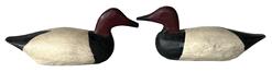 H405 Two miniature wooden hand carved canvasback Drake duck decoys in original paint. Carver unknown. Approximate measurements: 3 3/4" long x 1 1/4" wide x 1 1/2" tall