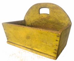 **SOLD** H516 Gorgeous 19th century New England yellow painted wall box featuring canted front and tall, rounded back with matching shaped cutout for hanging (or carrying) purposes. Exceptional, dry original painted surface with natural patina interior. Tiny wire nail construction. From our own personal collection. Measurements: 11 7/8� wide x 6 ½� deep x 8 ¼� tall (back). The sides and front are 4 3/8� tall.