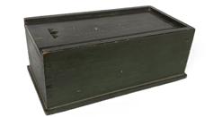 K1673 Early 19th century Pennsylvania slide lid Candle Box with original, dry-Windsor green painted surface. Slightly chamfered edges along the top with three symmetrically carved finger notches in the end of the lid allow easy opening of the smoothly sliding lid which opens to reveal a lidded till inside, and a clean, natural patina interior. Dovetailed case with tiny square head nail construction. Circa 1820s. The wood is pine. Measurements: 12 ¾ long x 6 5/8 wide x 5" tall 