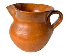 K1835 Beautiful orange glazed (Tobacco) Jugtown Ware Pottery Pitcher from Jugtown, North Carolina. Stamped Jugtown Ware on bottom. Great condition. Measurements: 7 ¼ across spout to handle. 3 ½ diameter bottom. Stands 5 ¼ tall.  