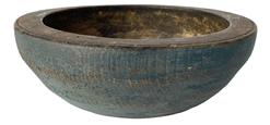 **SOLD** RM1533 Early 19th century New England hand turned wooden bowl with slightly raised footed base retaining its original pewter gray paint with remnants of old blue paint. Thick walled with incised ring around outer edge of the rim. Evidence of slow turnings and nice wear visible on the outside. Grungy old natural patina with evidence of chop marks inside. Very solid and sturdy bowl. Slightly out of round. Measurements: 6 ¾ x 7 top diameter tapers down to a 2 ¾ diameter slightly raised foot x 2 ½ tall. The rim is ¾ thick.   