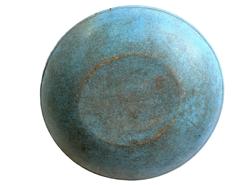 K1754 Early 19th century New England wooden turned bowl in original vibrant blue paint. Bowl is slightly out of round, features a tapered edge band around the rim and shows strong evidence of slow lathe turning on both the interior and exterior. Natural patina interior with great wear from years of use. Measurements: 10 x10¾ diameter. 1¾- 2 tall, depending on where measured.  