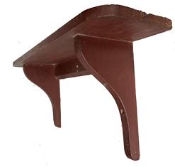 J393  Mid-19th century Pennsylvania original red painted pine shelf with shaped, dropped sides and a molded edge along the apron. Square head nail construction. Circa 1850s-1860s. From a collection in York, PA. Measurements: 26 ¼� wide x 6 ¾� deep x 11 5/8� tall.
