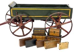 **SOLD** M1106 Wonderful, extremely detailed Salesman Sample wooden Box Wagon with "Luggage" bearing its original green, red and mustard yellow polychrome painted surface. Each of the nine (9) pieces of luggage are painted with details to simulate period suitcases and trunks, some with remnants of their original leather handles. Removeable box reveals the exceptionally detailed and well-made, working chassis. Solid wood and sheet iron construction with sheet iron realistically encircling each of the wheels. Overall measurements are 27 &frac34;� long including yoke x 10 &frac12;� wide at rear wheel centers x 8 &frac14;� tall at front of wagon. Internal depth of wagon is 2 &frac12;� deep. Luggage measurements range from smallest at 2 &frac14;� wide x &frac12;� thick x 1 &frac12;� tall to largest at 3 &frac12;� wide x 1 7/8� deep x 1 7/8� tall