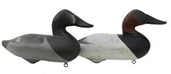 W329 Early pair of 1951 Canvasback  decoys by Charlie Joiner, Chestertown, Maryland.  Made when Charlie lived in Betterton, Maryland.  signed and dated 1951...and have his earliest "wavy" paint style.    These decoys are in excellent all original paint and very nice condition.  Early decoys such as these by Joiner are highly sought after