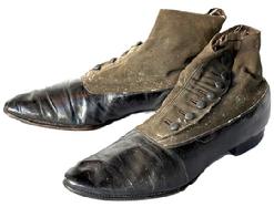 K1877 Pair of 19th century button top leather and canvas Shoes / Boots  the soles read SelZ Chicago and The Sole of Honor. Each of the shoes retains their original 7 buttons. SELZ is a brand of footwear manufactured and distributed by Chicago-based Selz, Schwab & Co. (1890-1929) and was known for the slogan SelZ Shoes  Make Your Feet Glad.  Approximately 11 ½ long x 3 ½ at widest point x 5 ¼ tall. 