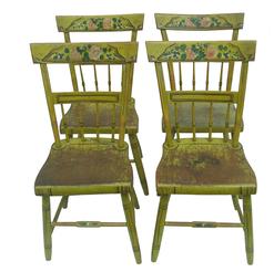 W310 Set of four paint decorated Pennsylvania chairs,  with half-spindle backs and plank seats. circa 1845-1865, probably in central Pennsylvania  The set is in great condition