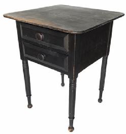 **SOLD** G599 Sheraton two-drawer work table with two tightly dovetailed drawers in old black paint. One board top with rounded corners. wonderfully turned legs. Sewing clamp marks present on uderside of top board.