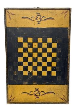 **SOLD** M164 Late 19th century Pennsylvania wooden double sided Game Board with Parcheesi on one side and Checkers on the other. Retains untouched crackled surface with polychrome colors including red and black on a mustard painted background. One board construction with applied molding on all sides. Small wire nail construction with a ring on top for hanging purposes. Measurements: 28 &frac14;� long x 19� wide x 1 3/8� thick