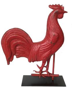 J23 Rooster weathervane, full-bodied copper and iron with original red painted surface. Dates to the second half of the 19th century. Circa 1870. Mounted on custom base for display purposes. Approximate measurements: 18 1/2" long x 4" wide. Mounted height is 22 1/2" tall. (Bottom of base measures 6" x 13 1/4").  One of the most enduring symbols in earlier America was the rooster. It was a dominant image for this country�s classic folk art including weathervanes, wood carvings and windmill weights.