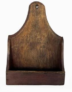 H934 Mid-19th century Pennsylvania Scouring Box with tall cut out on back board with beveled front edge, hole for hanging purposes and shaped sides. Great worn, uneven surface from years of scrubbing use. Square head nailed construction.   Measurements: 10 ½� wide x 3� deep x 14 ½� tall (center of back).
