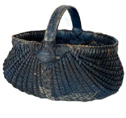 **SOLD** K1845 Late 19th century Pennsylvania Melon Basket of ribbed and woven oak splint construction bearing a beautiful original blue painted surface. Great condition. Approximate Measurements: 8 ½ long x 7 wide x 6 tall with handle.