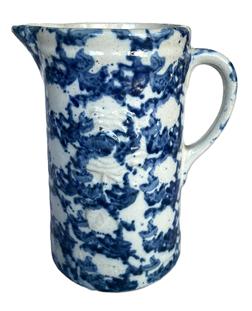 K1684 Rose Embossed Blue Spongeware Pitcher - Circa 1880s  1890s. Great condition with one visible turkey track on interior glaze at top rim. Measurements: 5 ½ bottom diameter x 9 tall. 