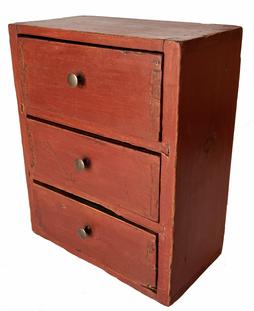 G923 Set of three drawers in old dry red paint. Square nail construction with dovetailed case and dovetailed drawers. The stretchers are also dovetailed into the case. Very sturdy. Measurements: 10" wide x 5 1/4" deep x 12" tall