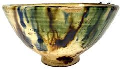 CM8 Spectacular tri-color thick glazed redware bowl on footed base featuring brown, blue and green on an ivory-color background. Measurements: 8 top diameter x 3 diameter footed base x 4 ¼ tall.