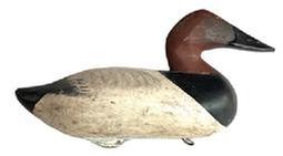 L386 Canvasback Drake Decoy carved by R. Madison Mitchell (1901-1993) of Havre de Grace, MD. Decoy is Branded "HMcM" (for the Harold McMullen Rig) on bottom. Original painted surface - Electric pen signed by R. Madison Mitchell - and dated 1948 � on bottom. Original weight, staple and ring remain intact on bottom. Evidence of being shot over is present throughout.  