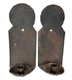L435A Pair of matching late 18th century to early 19th century single-candle sconces with deeply fluted candle cups. The rolled tin / sheet metal construction features rounded tops, punched wriggle-work designs and rolled edges on the backs. Most American homes were lit with simple candle sconces such as these. This pair of New England Sconces have the best, uncleaned surface and remain in good original condition. Each sconce measures ~4 &frac12;� wide x ~3 &frac12;� deep x ~10 3/8� tall.  