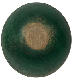 **SOLD** L343 Early 19th century New England wooden turned bowl retaining its old green painted surface. Bowl is slightly out of round, features a band around the rim and shows strong evidence of slow lathe turning on both the interior and exterior. Natural patina interior with a few age cracks that do not affect the integrity of the bowl. Great wear from years of use. Measurements: 15 &frac14;� x 14 &frac14;� diameter x 4 &frac14;� tall. 