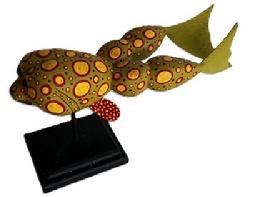 M291 Folk Art Carved Frog Decoy carved by Ryan Dockiewicz (b.1974) of Cape Charles, Virginia. Signed and dated �09 on bottom. This talented Virginia carver is known for utilizing his imagination to create Folk Art fish and decoy carvings featuring oversized eyes and brightly colored paint patterns. Mounted on a wooden stand for display purposes. Frog measures ~10 &frac14;� long x ~2 &frac34;� wide. Overall mounted height is ~5 &frac12;� tall.