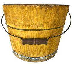 G236 A mid to late 19th century paint decorated bucket , Lancaster Co., Pennsylvania. Arched wire bail handle with turned wooden grip. The interior is old natural paintia , exterior painted with an overall grained mustard color over a yellow ground