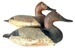 L259 Rig Mate Pair Canvasback Decoys carved by Will Heverin (1860-1951) from Charlestown, Maryland bearing very early working repainted surfaces. Both are Branded PM on bottoms of tails which stands for the Paul Murphy Rig. These were found in a rig in Kennedyville, MD.