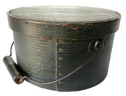 F438 19th century New England Bail Handle Pantry Box with the original dry windsor green paint ,with over lapping bentwood sides, secured with small metal tacks. The sides of the Box are fitted with a pair of oval stamped tin handle mounts.