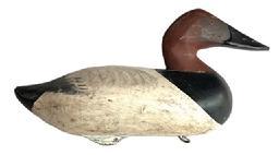 L386 Canvasback Drake Decoy carved by R. Madison Mitchell (1901-1993) of Havre de Grace, MD. Decoy is Branded "HMcM" (for the Harold McMullen Rig) on bottom. Original painted surface - Electric pen signed by R. Madison Mitchell - and dated 1948 on bottom. Original weight, staple and ring remain intact on bottom. Evidence of being shot over is present throughout.