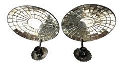 L308 Pair 19th century hanging tin wall sconces with round mirrored backs and fluted edge drip cups. Nicely rolled edges with secure solder joints. Measurements: Mirrored area measures 7 ¾ diameter. Overall height is 8 ¾ tall and the outer front edge of the drip cup extends 5 from the wall when hanging.