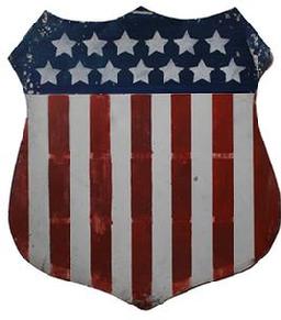 C79 Late 19th century, patriotic sheild, American. In the shape of a shield with original painted surfaces. The 13 star crest above a 13 stripe banner. 