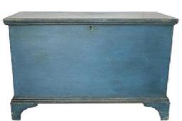E206 EARLY 19TH CENTURY BLUE PAINTED PINE PENNSYLVANIA BLANKET CHEST. This is a wonderful early 19th Century painted blanket chest from South eastern Pennsylvania, with ORIGINAL blue paint. The surface undisturbed, the exterior of the case crafted of six broad planks of Eastern White Pine, the sides and bottom joined with exposed dovetail construction. The base is affixed with small nails and the feet