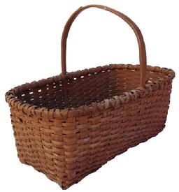 Z576 Late 19th century Gathering Basket with the original nutmeg paint, single wrapped rim with a nice high steamed and bent handle, tightly woven. The handle has been repaired,  measurement 18" long x 10" wide