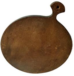 D253b 19th century Penndylvania wooden cutting board, with the original dry green paint on back side and the old natural patina on the front, with a shape top and hold for hanging Measurements are 20 3/4" tall x 17 1/4" wide x 3/4" thick