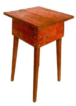 M130 19th century Eastern Shore, Maryland original red painted side table with wrap around apron resting on tall, splayed legs. Very primitive, square head nail construction. Circa 1860s. Measurements: 17 ¼ x 16 5/8 x 31 tall.