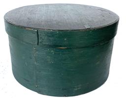 G670 19th century original green painted pantry box with steamed and bent sides secured with tiny wooden pegs and tacks. Great natural patina inside. Very sturdy. Measurements: 10� diameter x 5 1/2� tall  