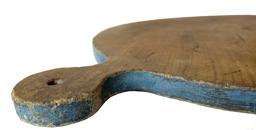 H261 Early round Bread / Dough Board with lollipop-style handle retaining remnants of the original dry blue paint around the edges. Hole in center of lollipop handle for hanging purposes. Natural patina surface on both sides shows great wear from years of use. One board construction. Measurements: 19 ½� wide x ¾� thick x 24� tall