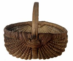 H480 � Early, tightly hand-woven oak splint egg basket boasting woven details at the juncture of the two main ribs. Original aged, natural patina surface. Great size and condition! Measurements: 8 ½� x 8 ¼� diameter x4� tall (sides) x 7 ½� tall (handle)