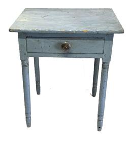 M1133 Pennsylvania one drawer table with Sheraton-style turned legs that are mortised into the apron. Table bears old blue painted surface over original green paint. The wood is pine with square head nail construction. Circa 1860�s.