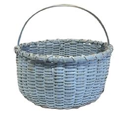 M1181 19th century Pennsylvania hand woven Basket featuring early blue painted surface with a double wrapped thick wooden rim and a steamed and bent handle that is tightly woven into the basket.  Basket has good weight and a nice, tight weave, with an interior bumped up bottom to help with weight distribution. Measurements: The opening is 11 &frac12;� diameter. Sides are 6� tall, and overall height including handle is approximately 10 &frac12;� tall. 